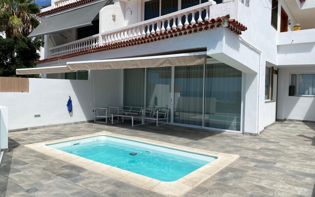Reforma 2 viviendas, ampliación terrazas y piscinas en Acantilado de los Gigantes