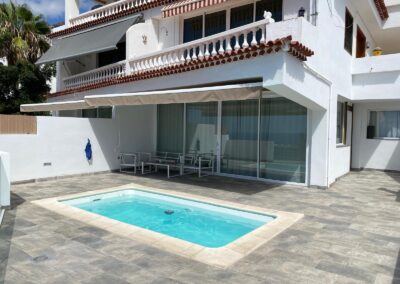 Reforma 2 viviendas, ampliación terrazas y piscinas en Acantilado de los Gigantes